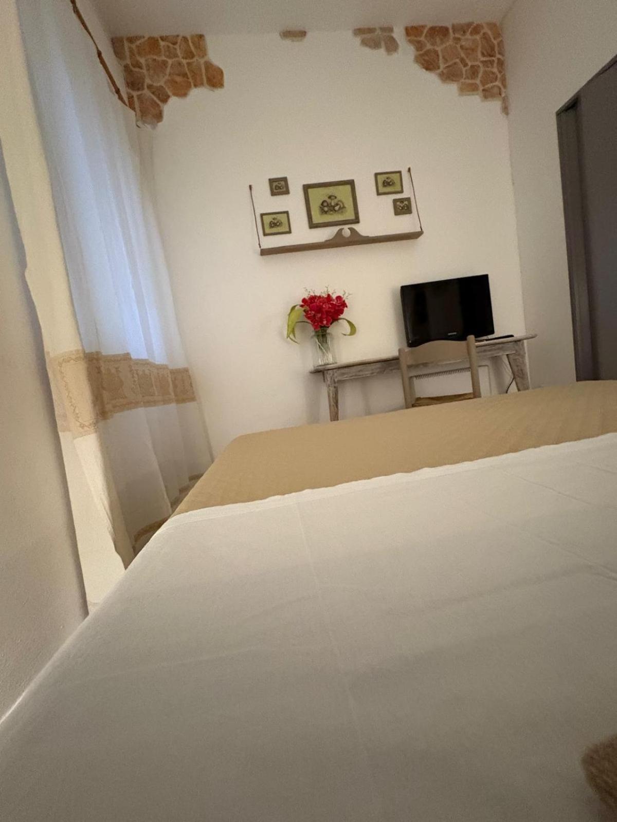 Vittorina'S Home Sorso Bagian luar foto