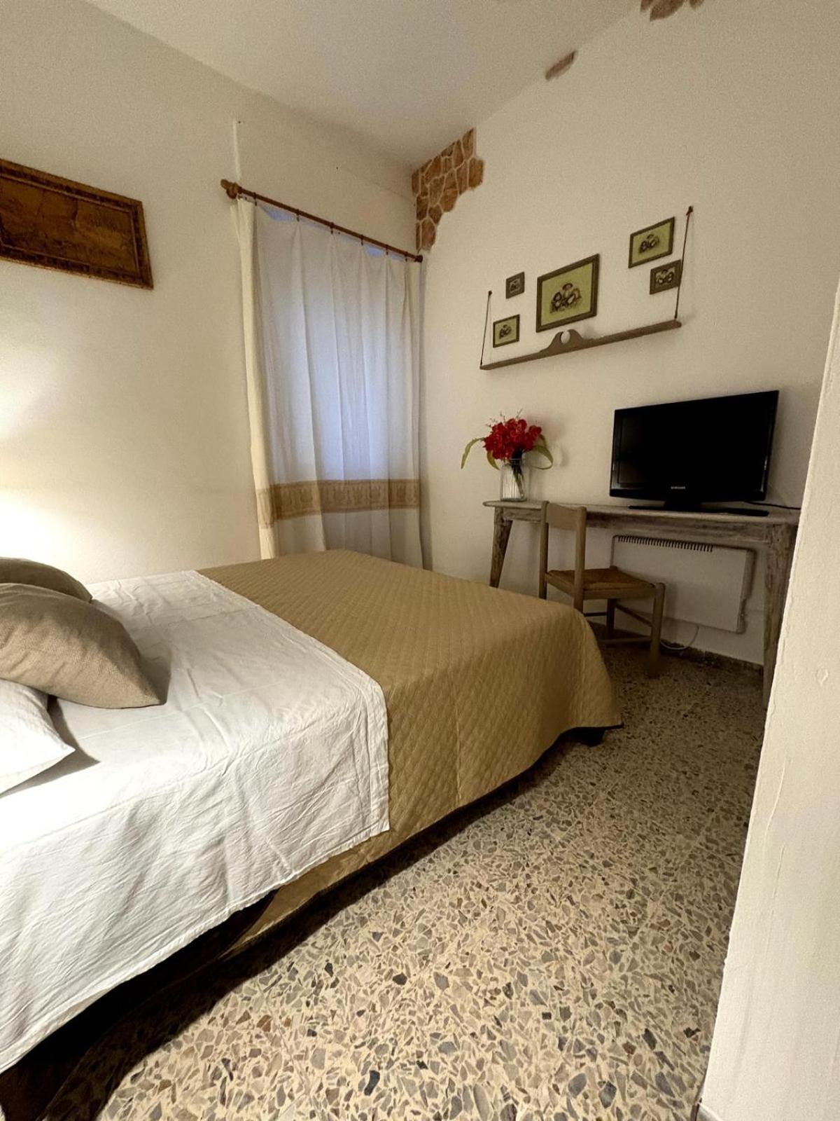 Vittorina'S Home Sorso Bagian luar foto